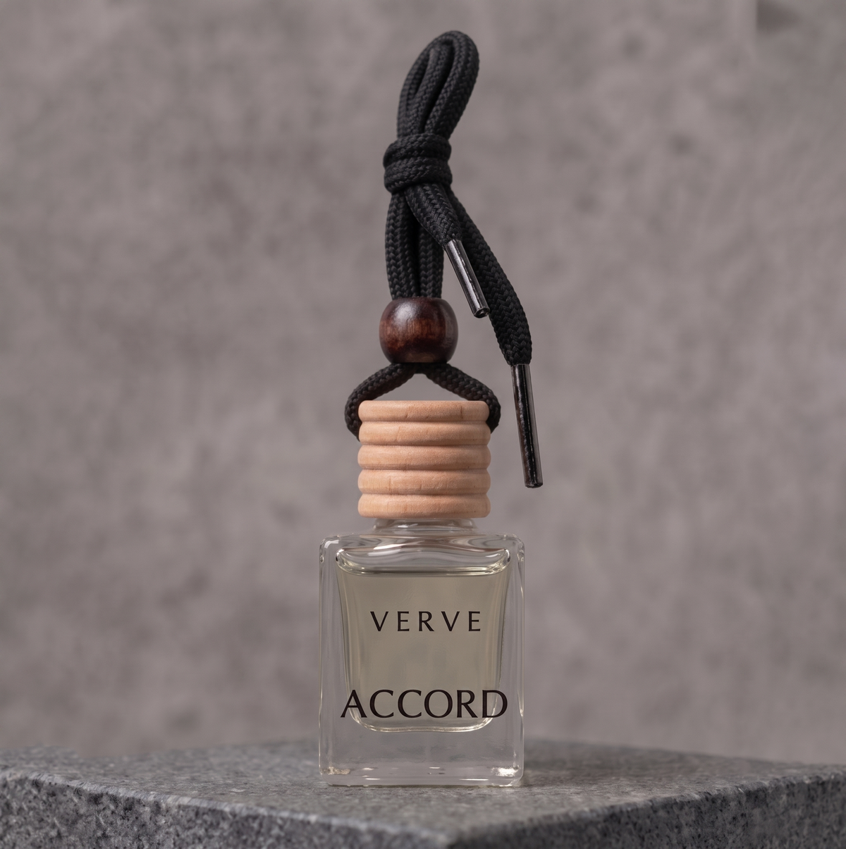 VERVE Accord luxury car perfume hanging bottle on dark stone plinth