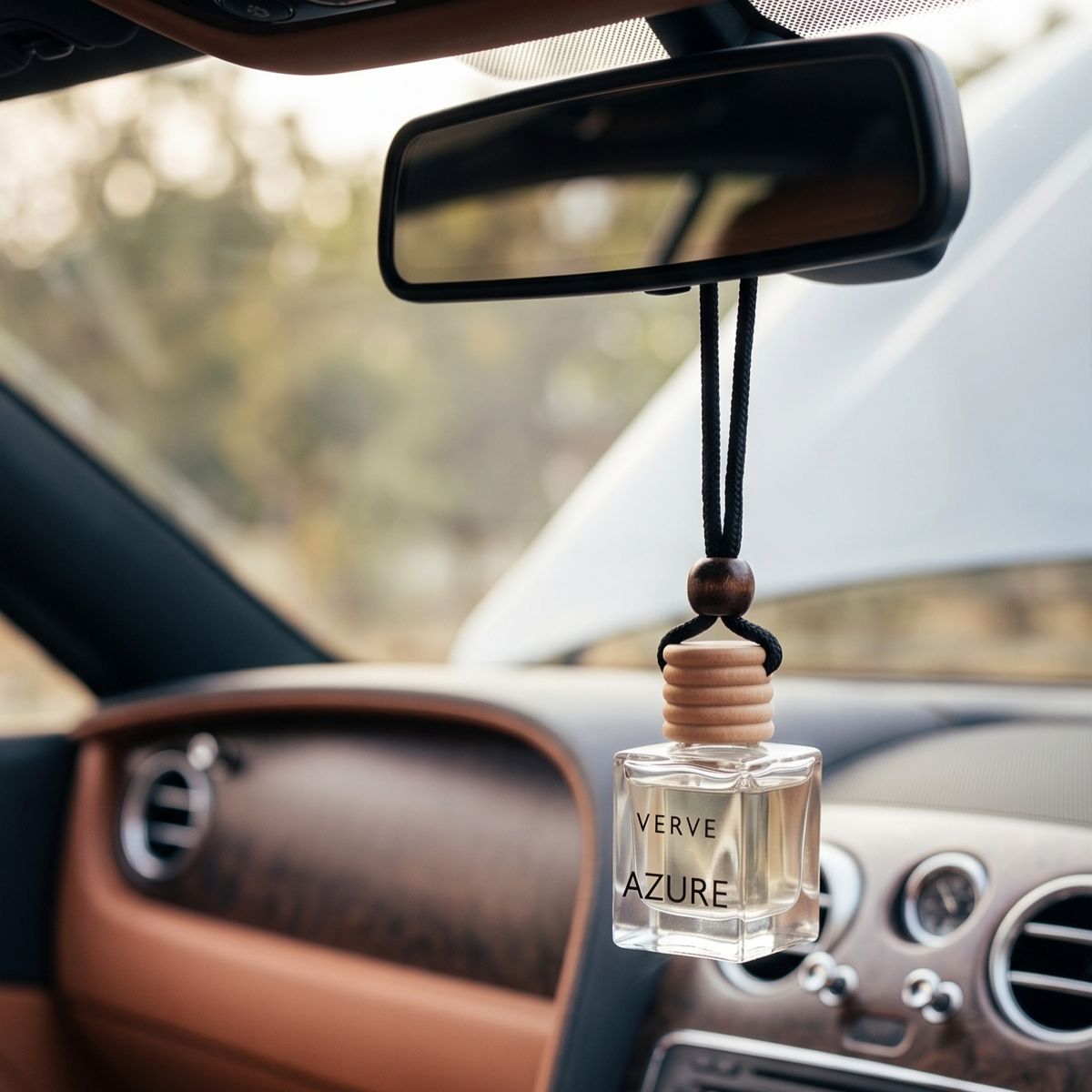 VERVE Azure car perfume hanging from rear view mirror in leather interior